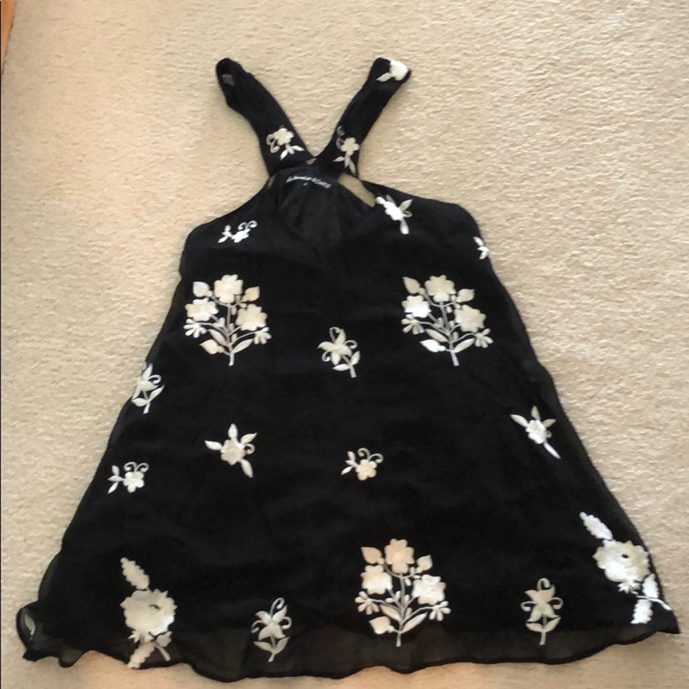 Black mini dress with white hand stitched flowers